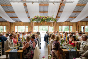 Wedding Barn wedding breakfast with guests seated